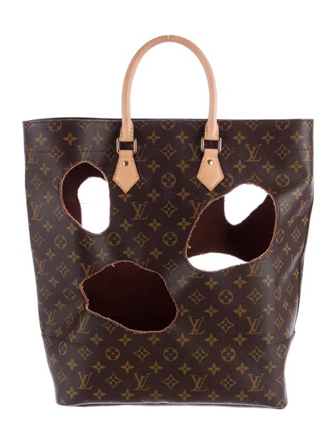 rei kawakubo louis vuitton bags|Louis Vuitton bags with holes.